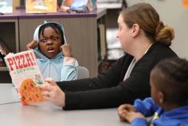 Photos: DeKalb's Mitchell Elementary School teachers connect with students in the library