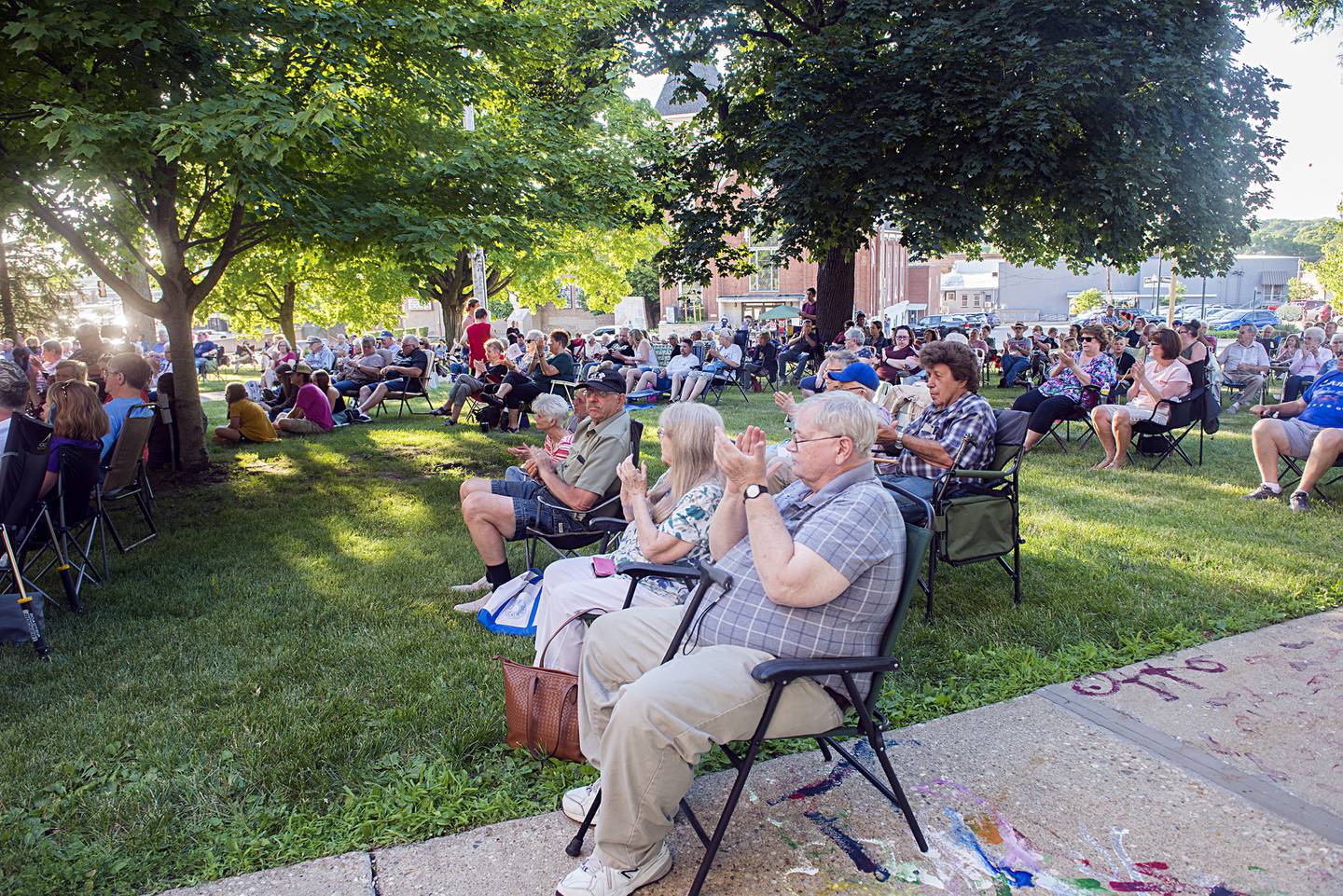 Hundreds of people showed up in support of the Dixon Municipal Band as they played their annual July 4 concert on the lawn of the Old Lee County Courthouse on Friday, July 1, 2022.