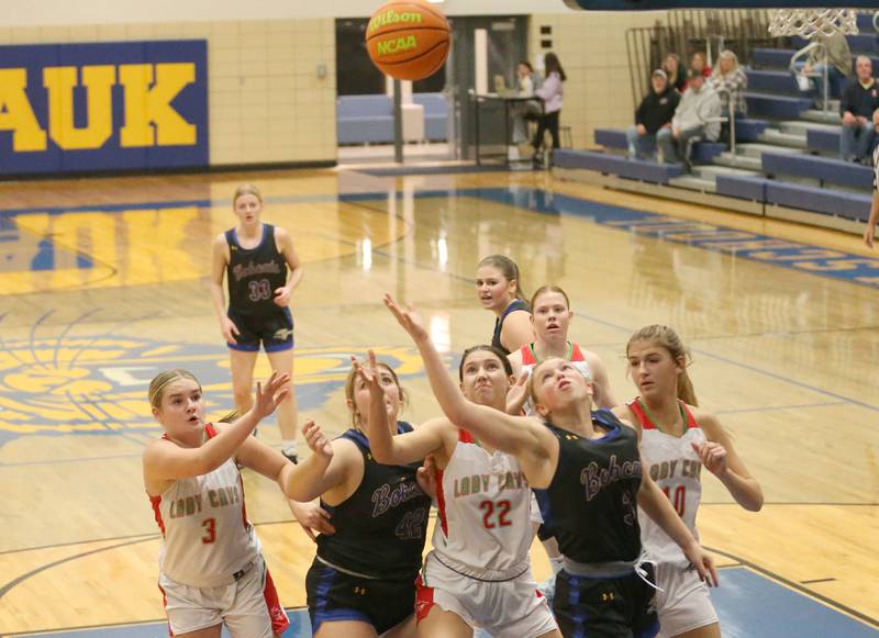 The ball is tiped in the air as players from Somonak and L-P try to gain possession during the Tim Humes Breakout Tournament on Friday, Nov. 22, 2024 at Somonauk High school.