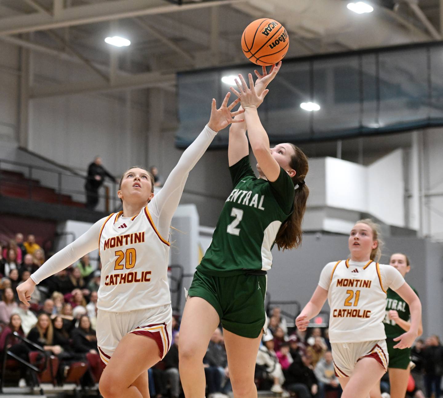 Montini's Lily Spanos, left, defends a shot by Grayslake Central's Mosey Drevline during the Hersey Class 3A supersectional on Monday, March 3, 2025 in Arlington Heights.
