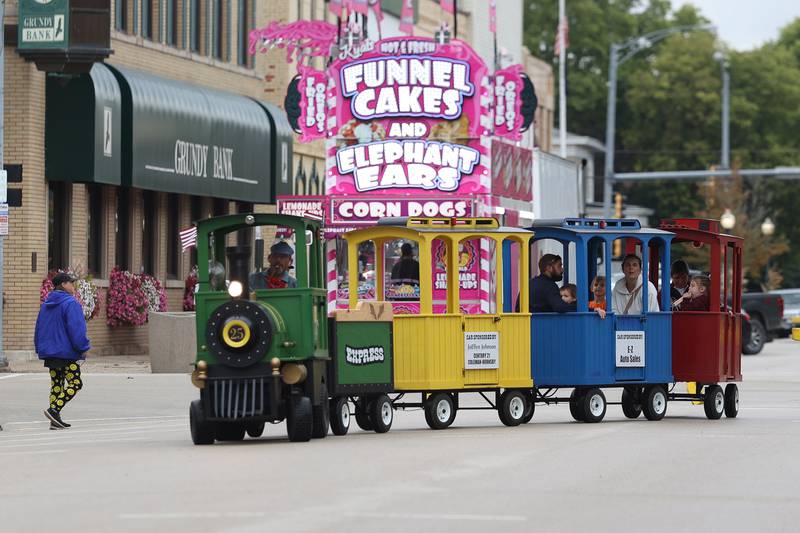 A train rides down West Washington Street at the 75th Annual Grundy County Corn Festival on Saturday, Sept. 28, 2024 in downtown Morris.
