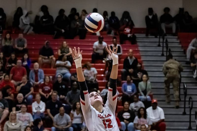 Bolingbrook's Catherine Daniels sets-up a teammate during a varsity volleyball home game against Minooka on Sept. 25, 2025.