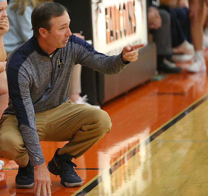 Marquette's head girls basketball coach Eric Price coaches his team against Fieldcrest in the Integrated Seed Lady Falcon Basketball Classic on Thursday, Nov. 17, 2022 in Flanagan.