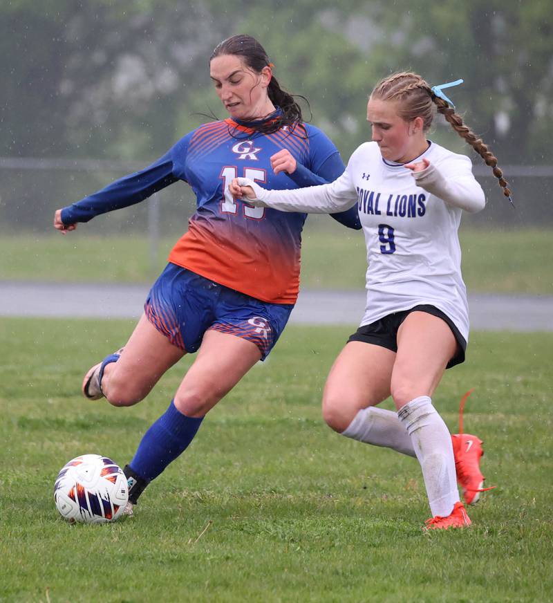 Genoa-Kingston's Samantha Wendt (left) kicks the ball away from Rockford Christian's Ava Reese Tuesday, May 20, 2025, during their Class 2A regional final game at Rockford Christian High School.