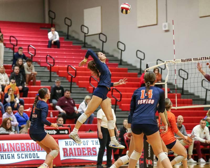 Oswego's Sidney Hamaker (13) spikes the ball during Class 4A Bolingbrook Sectional final match between Lockport at Oswego.  Nov 7, 2024  in Bolingbrook.