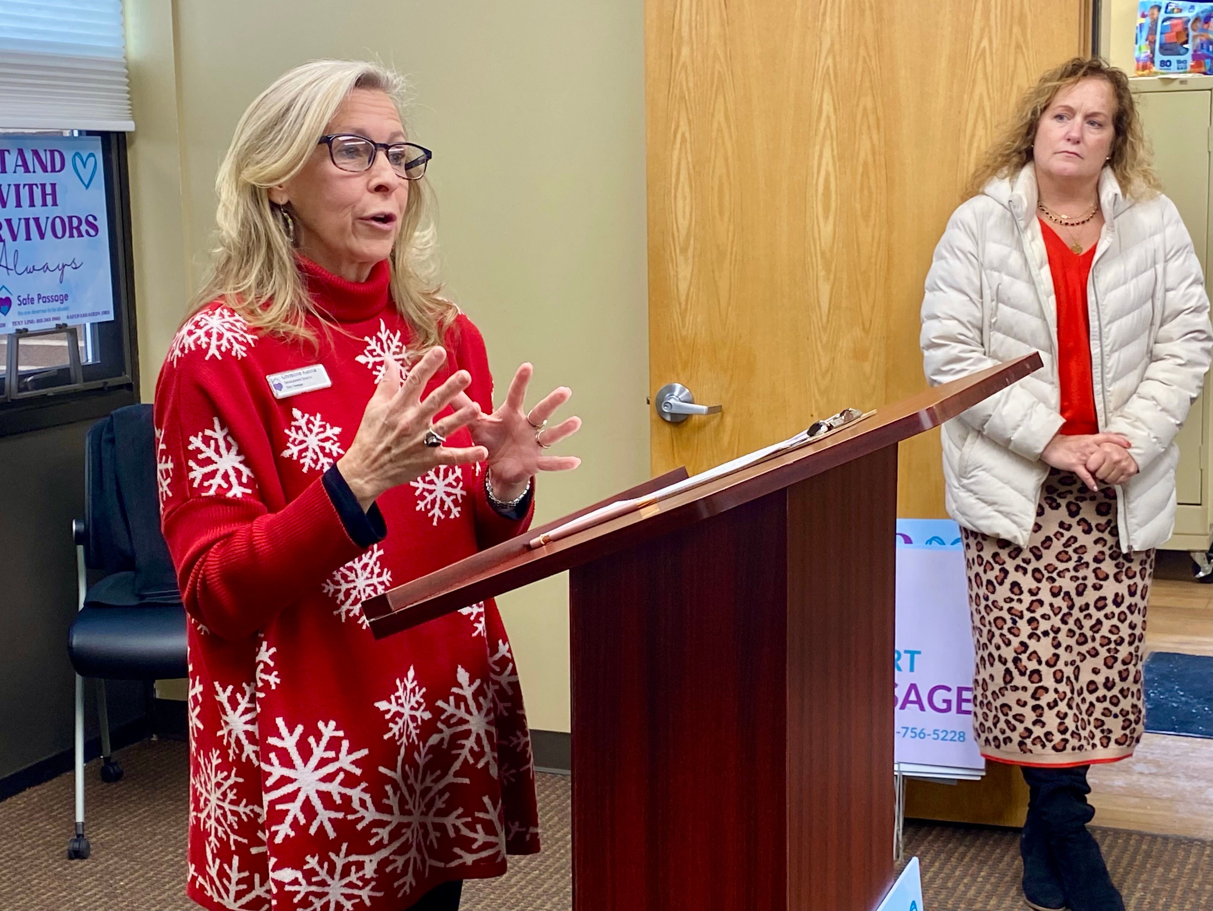 Christine Kalina (left), development director of Safe Passage Inc., speaks as Jennifer Yochem, community services coordinator of the city of DeKalb watches, on Friday, Dec. 5, 2025, at a groundbreaking ceremony for the agency's new crisis shelter, expected to begin construction in the spring.