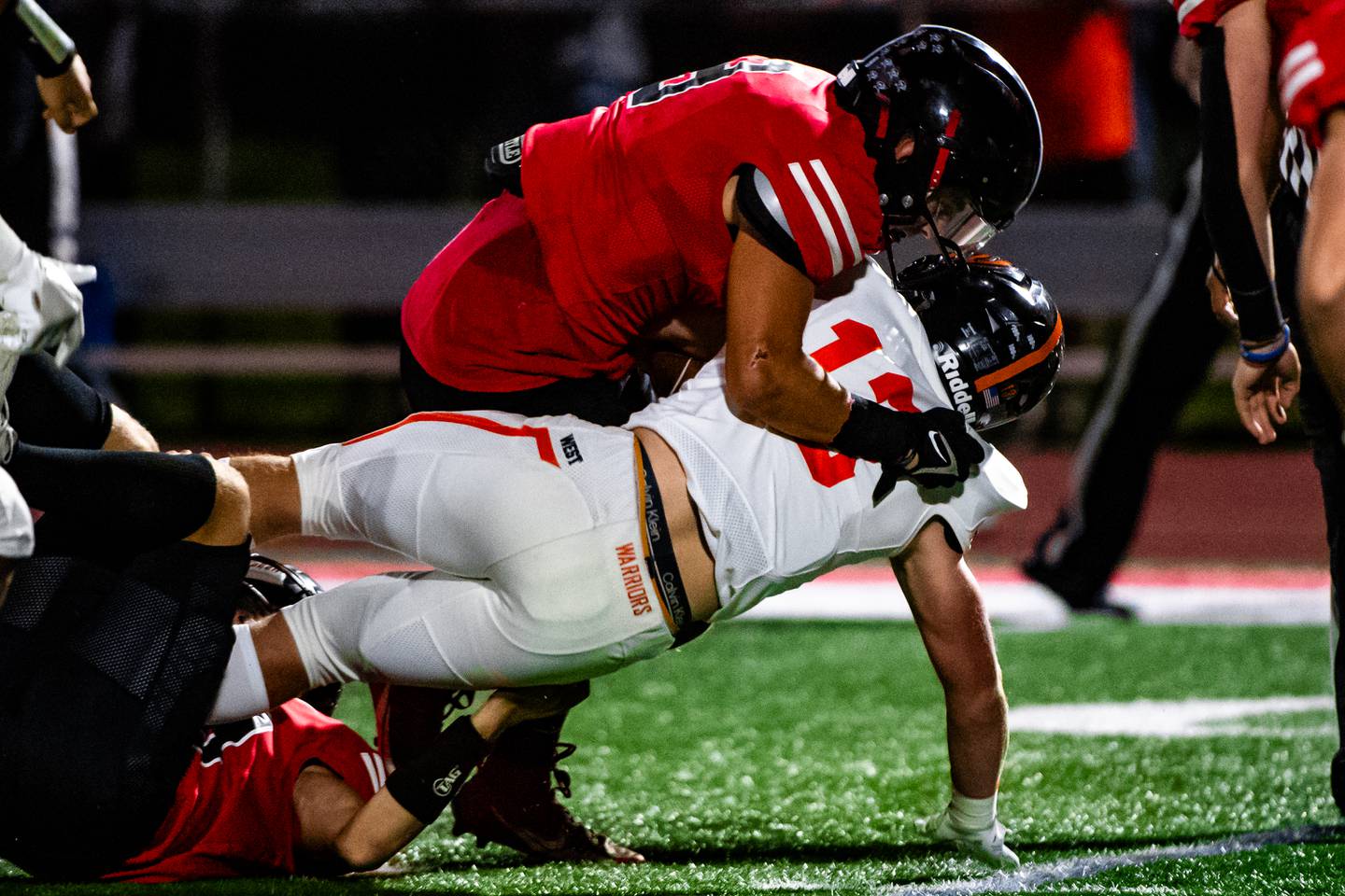 Lincoln-Way Centrals Nick Mitcheff brings down Lincoln-way Wests Joey Campagna During a game on Friday Sept. 15, 2023 at Lincoln-Way Central High School in New Lenox