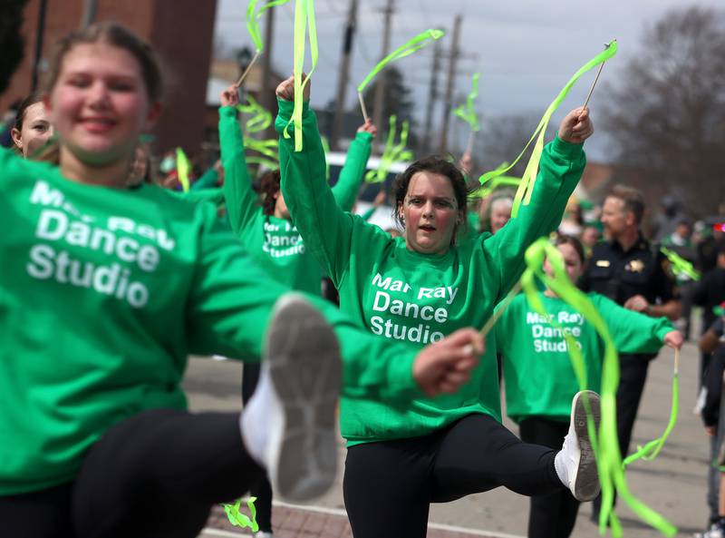 Mar Ray Dance Studio team members perform during the ShamROCKS the Fox Parade as it passes near Veterans Park in McHenry on Saturday, March 15, 2025.