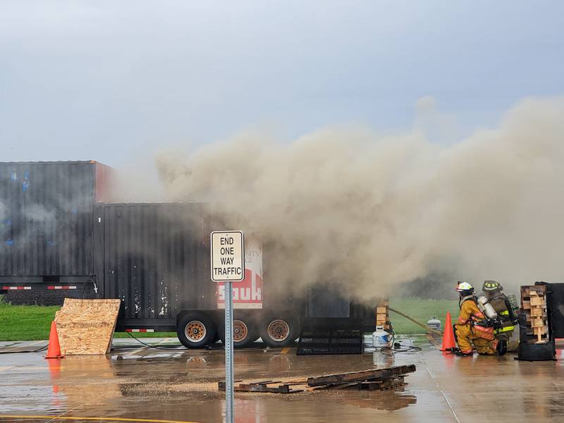 Firefighter training on Saturday involved coping with a "flashover." A flashover occurs when a room reaches a high temperature where everything in it ignites, including the smoke itself. Temperatures for a flashover can reach higher than 1,000 degrees.