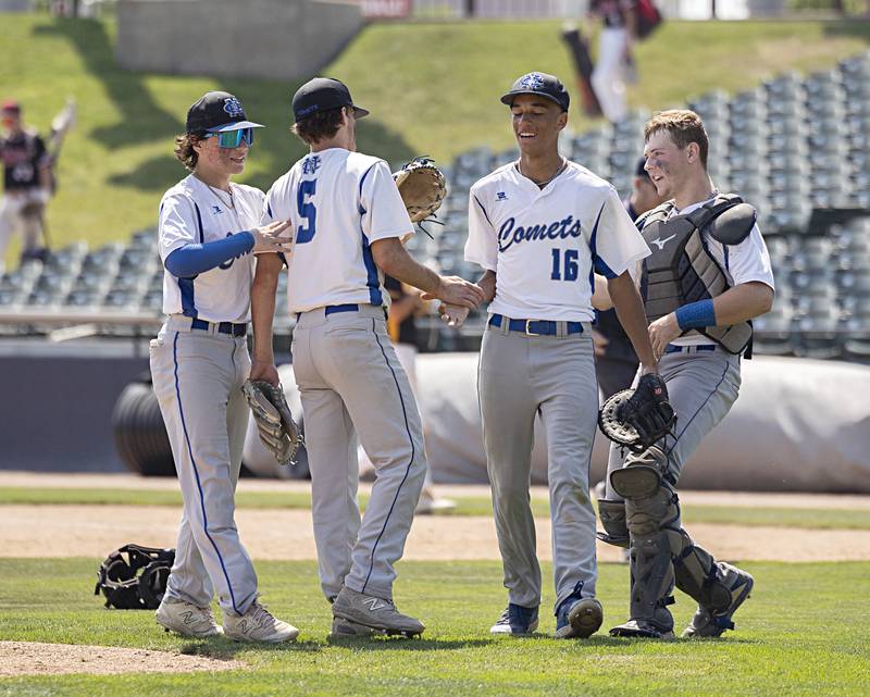 Newman celebrates taking third place in state over Goreville 6-2 Saturday, June 3, 2023 during the IHSA class 1A baseball game.