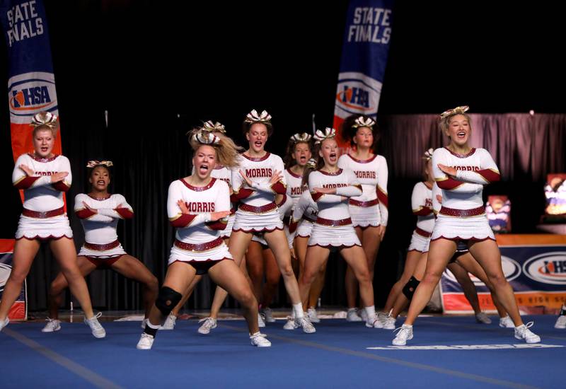 Members of the Morris cheerleading team compete in the medium team division of the IHSA State Finals on Saturday, Feb. 8, 2025 at Grossinger Motors Arena in Bloomington.