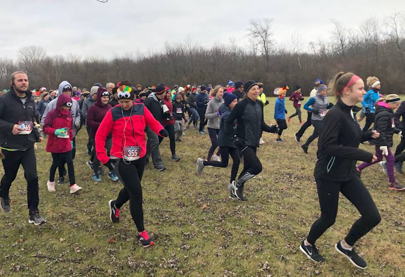 Runners participate in the annual Thanksgiving Day 5K Run/Walk held by the Hillstriders Running Club.