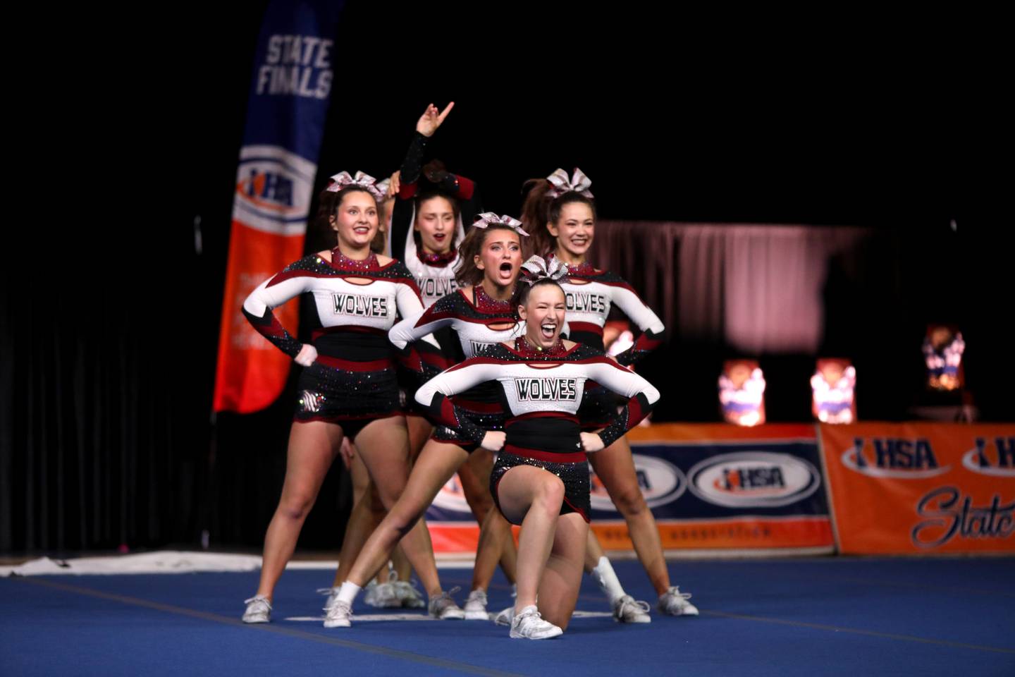 Members of the Prairie Ridge cheerleading team compete in the medium team division of the IHSA State Finals on Saturday, Feb. 8, 2025 at Grossinger Motors Arena in Bloomington.