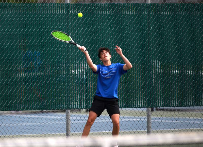 St. Charles North’s Ben Goddard returns the ball during the first round of the 2A boys state tennis meet with doubles partner Cole Weddle (not pictured) on Thursday, May 29. 2025 at Hersey High School.