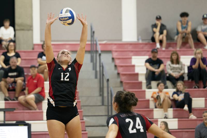 Sterling’s Marley Sechrest hammers a shot against Rock Island Tuesday, Sept. 17, 2024.