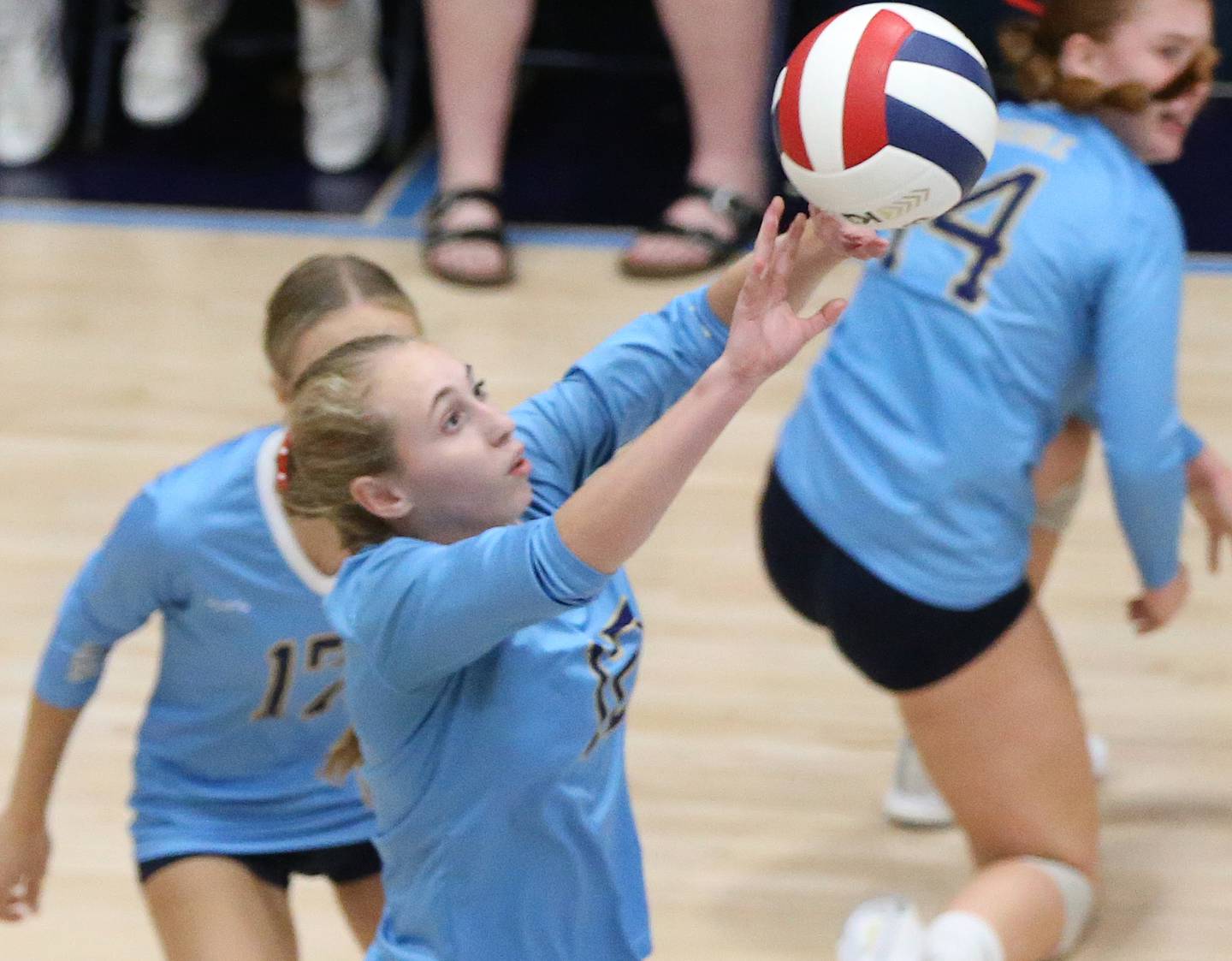 Marquette's Lilly Craig pushes the ball over to the Hall side of the net on Monday, Sept. 25, 2023 at Bader Gym.