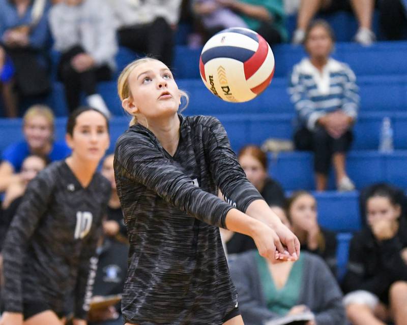 St. Francis's Addi Samolinski (17) bumps the ball during the first game of the match against St. Charles North on Wednesday Oct. 2, 2024, held at St. Francis High School in Wheaton.