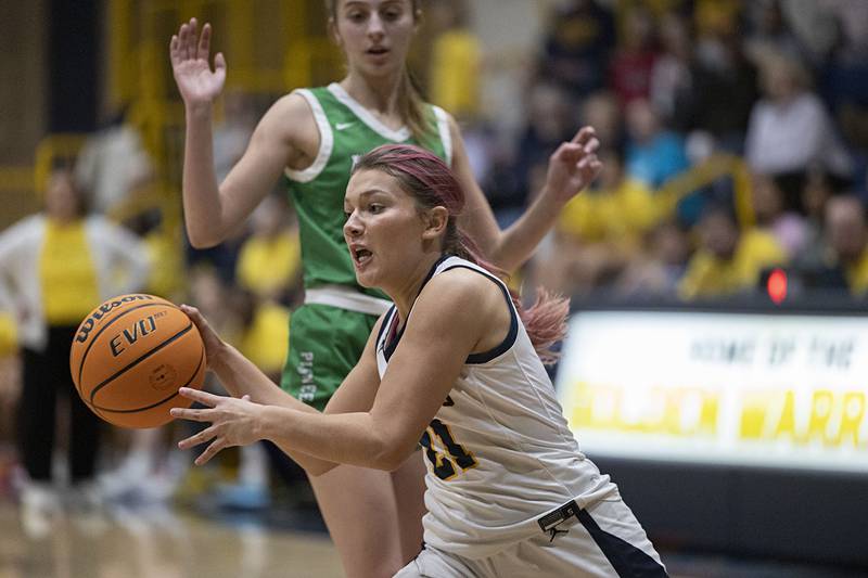 Sterling’s Jaelynn James dishes off a pass against Alleman Thursday, Jan. 29, 2026.