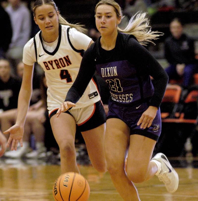 Dixon's Reese Dambman brings the ball upcourt defened by Macy Groharing of  Byron. The Byron Tigers won over the Dixon Duchesses 46-43 in overtime. The girls basketball game took place at Byron on Saturday, January 24th, 2026