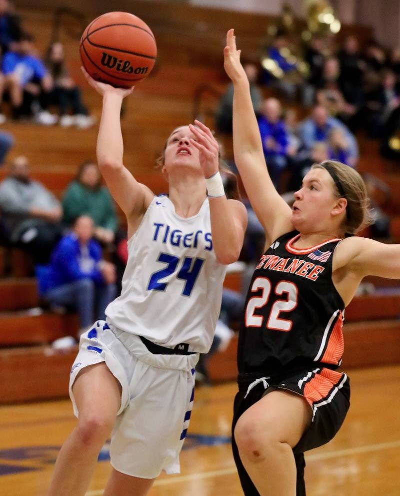 Princeton's Keighley Davis drives against Kewanee's Marissa Stevens Monday night at Prouty Gym.
