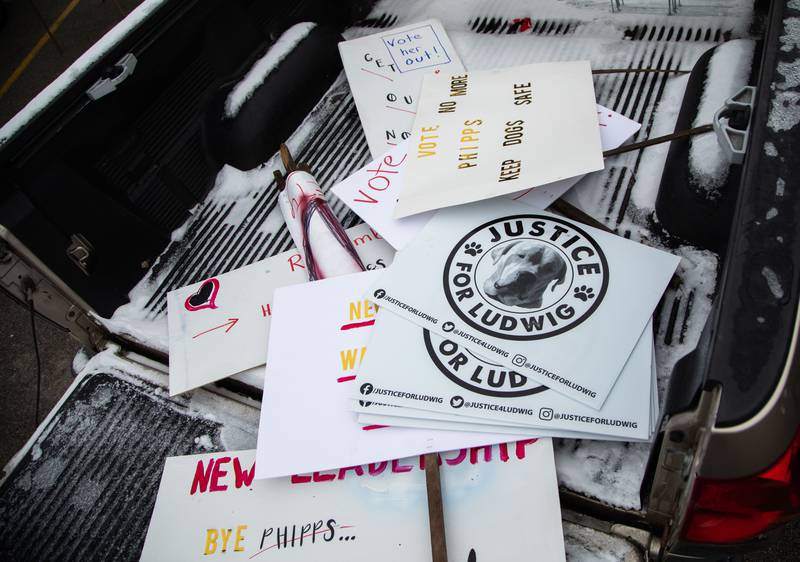 Signs for protesters sit in the back of a truck before the Justice for Ludwig Protest at the Little Home Church by the Wayside in Wayne on Saturday, Jan. 7, 2023.