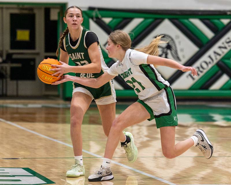 Hannah Heiberger (22) of St. Bede holds ball whilst looking for open teammate as Dwight's Addy Sulzberger (21) tries to steal ball on Monday, January 19, 2026 at the Krese Memorial Gymnasium in Dwight.