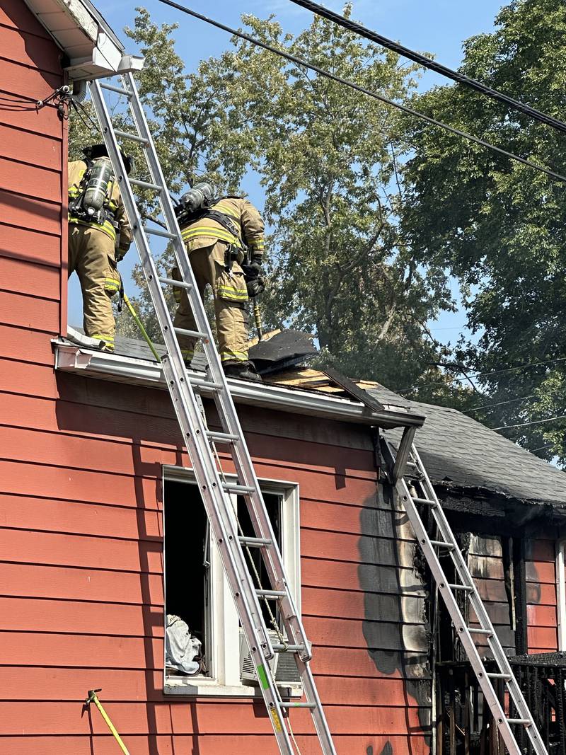 La Salle and Peru firefighters work the scene of a structure fire in the 300 block of Crosat Street on Thursday, Sept. 19, 2024 in La Salle. The fire happened shortly after 12:30p.m.
