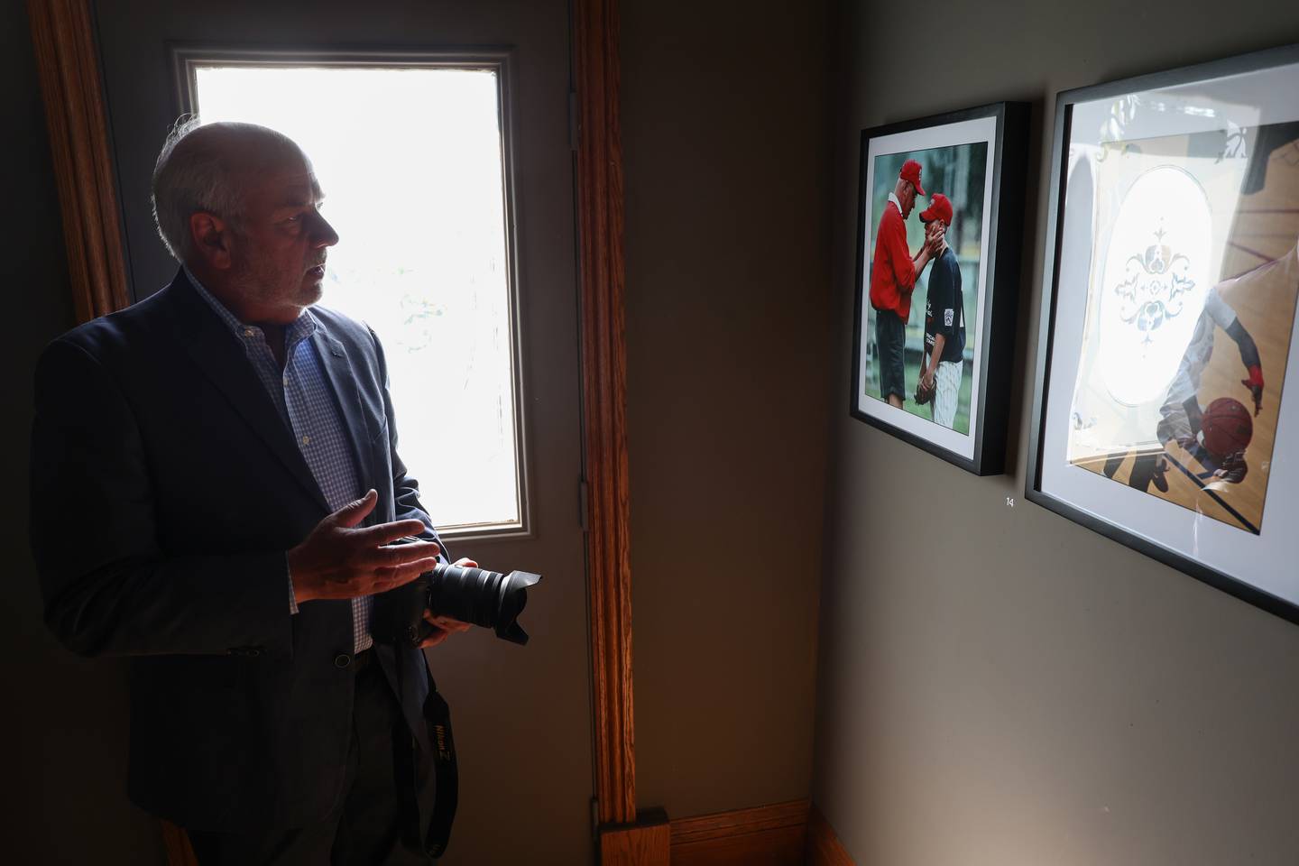 Bill "BJ" Jurevich, a longtime Daily Journal photographer, reflects on photos featured in his new gallery titled, Life Through the Lens: A Photographic Retrospective, which runs through Oct. 25 at the Victorian House Gallery, 577 S. Main Street in Bourbonnais.