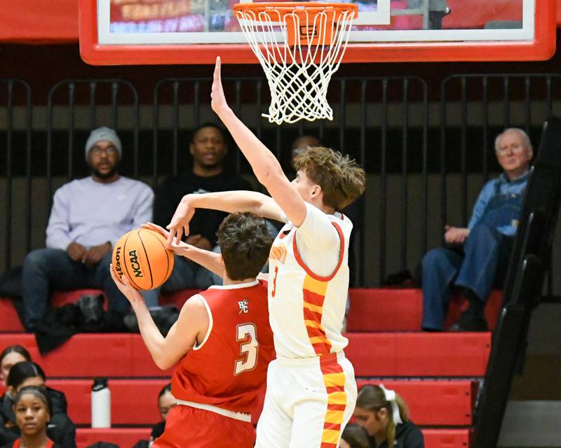 Hinsdale Central's Cole Bero (3) gets fouled by Batavia's Evan Blankenship (3) during the game on Saturday Jan. 24, 2026, held at Batavia High School.