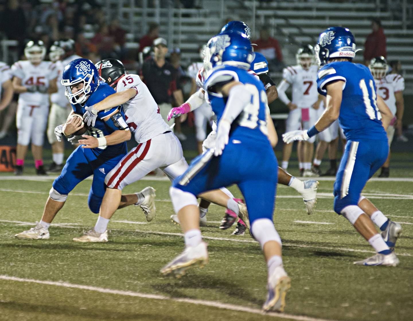 Newman's Ethan VanLanduit runs the ball Friday, Oct. 8, 2021 against Hall.