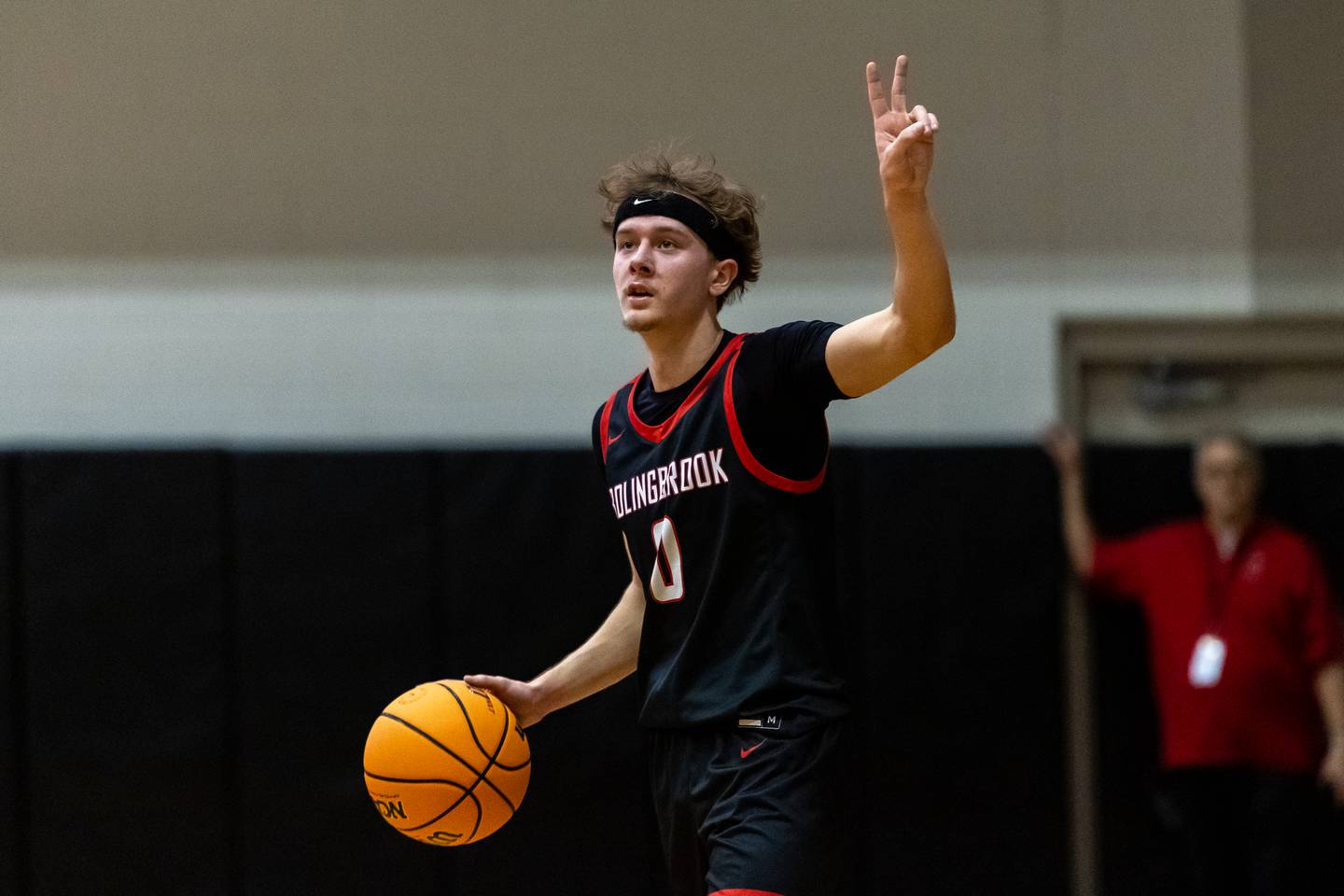 Bolingbrook's Trey Brost sets-up a play during the 4A Bolingbrook Sectional semifinal boys basketball game against Neuqua Valley in Bolingbrook on March 4, 2026.