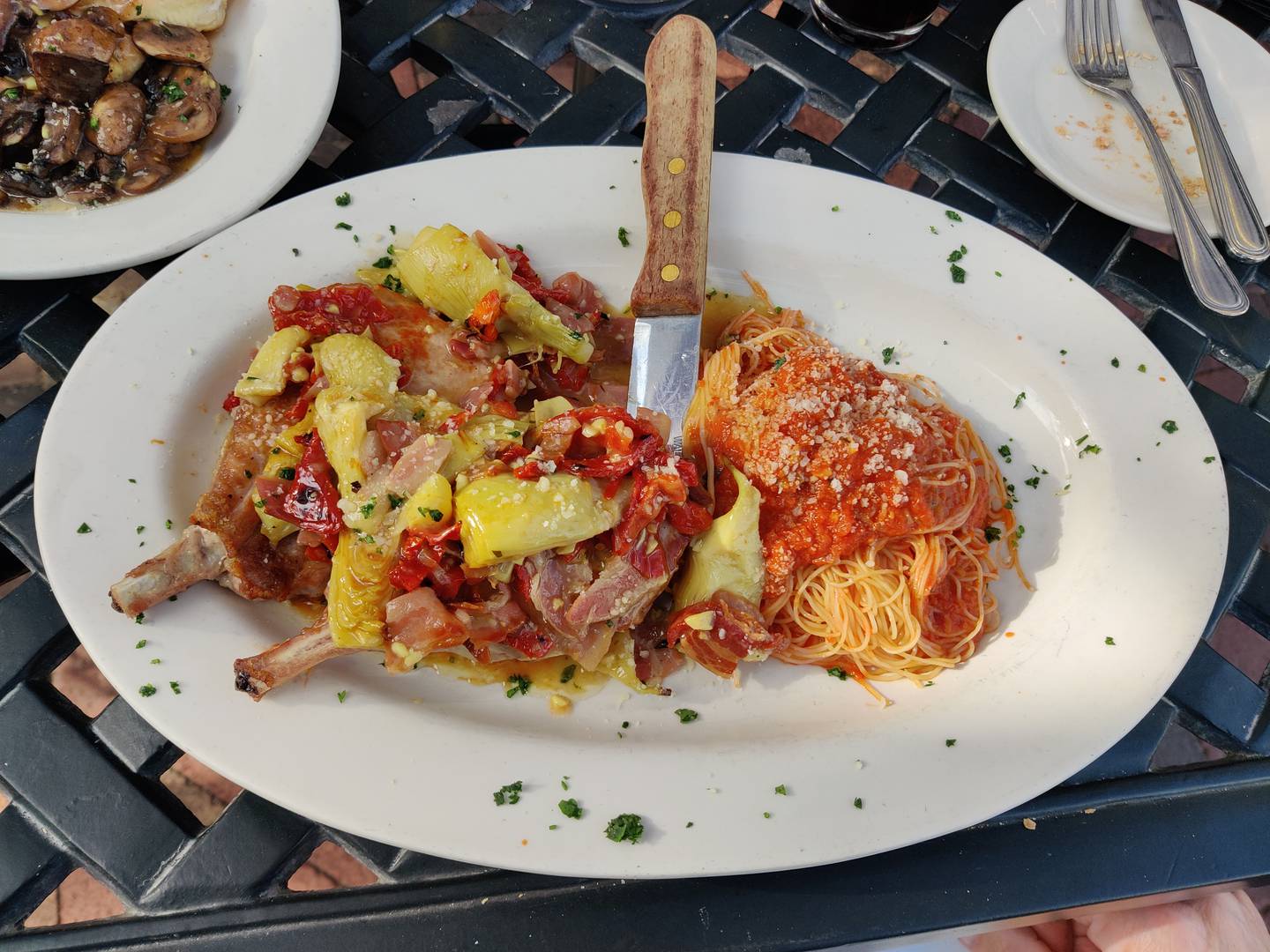 Pork Chops Artigliano at La Za'Za' Trattoria in St. Charles.