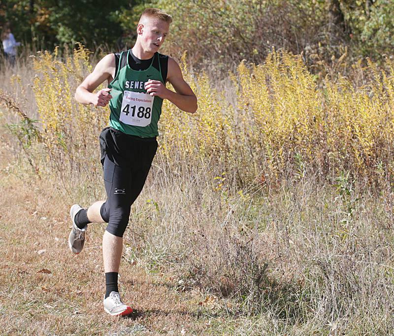 Seneca's Austin Aldridge runs in the Class 1A Regional Cross Country boys race on Saturday, Oct. 22, 2022 at the Seneca FFA Farm in Marseilles.