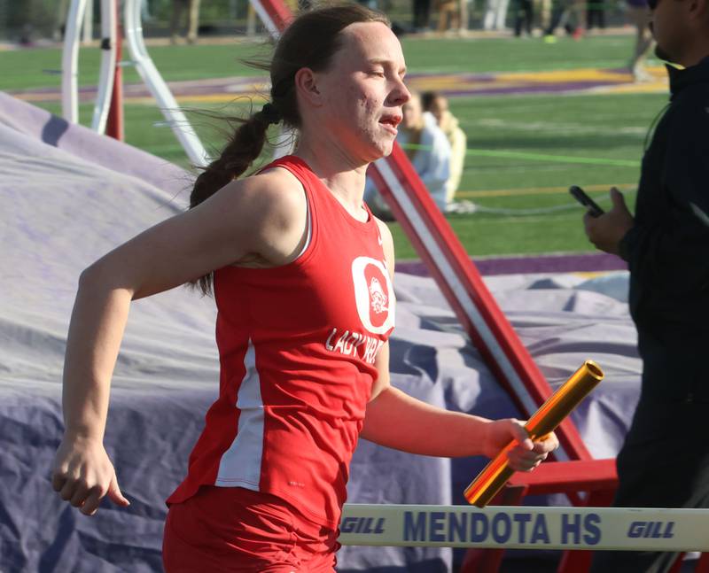 Ottawa's Karsyn Moore runs the 4x200 relay during the Class 2A Sectional track meet on Wednesday, May 13, 2026 in the Jeff Prusator Athletic Complex at Mendota High School.