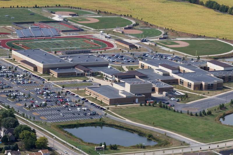 An aerial view of DeKalb High School is seen from a fully restored Ford Tri-Motor model 4-AT-E plane on Thursday, Sept. 21, 2017 at DeKalb Taylor Municipal Airport in DeKalb.  The plane, nicknamed "Tin Goose" was the largest civilian passenger aircraft during its time in service from 1909-1926, and currently seats ten passengers during its present tour.