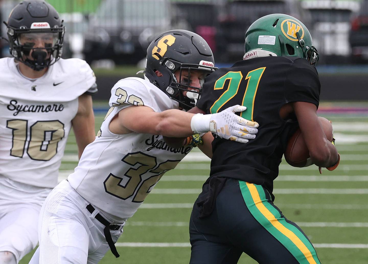 Sycamore's Landon Egler brings down Westinghouse's Jaidyn Gandy Saturday, Nov. 9, 2024 during their Class 5A second-round playoff game at Knute Rockne Stadium in Chicago.
