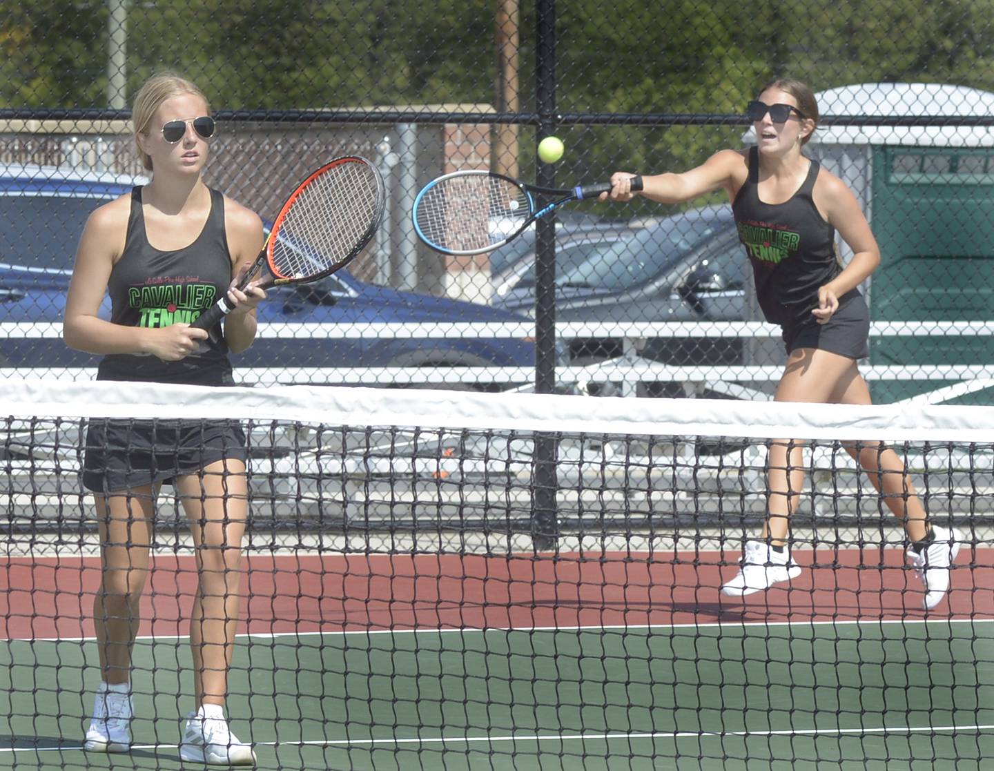 La Salle Peru’s Kaylee Reese and Elena Leone compete in the #1 doubles match against Sterling Saturday at the LP Sports Complex in Peru.
