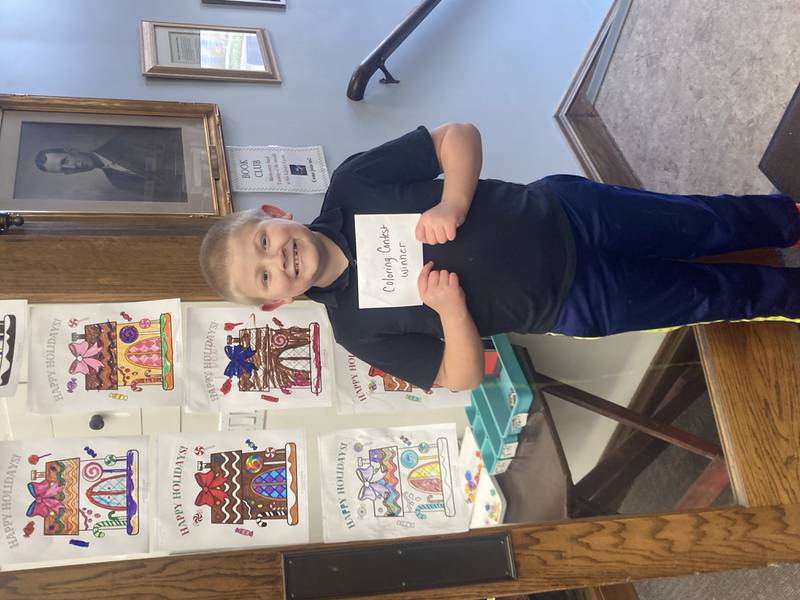 Ethan Richards was named the winner of the Christmas Coloring Contest contest at Phophetstown's Henry C. Adams Memorial Library and his prize was a gift certificate to Scoops Ice Cream and Grill.