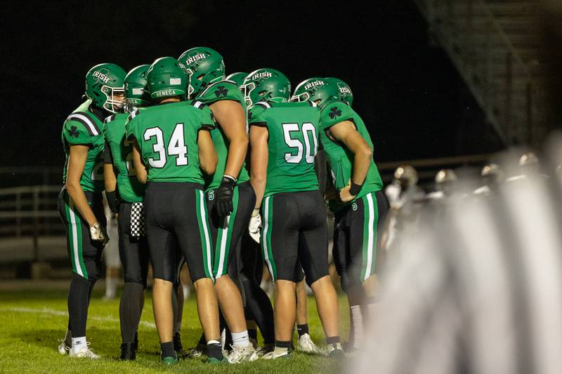 Seneca huddles on field during their 2025 home opening game against Chicago Christain on Friday, Aug 29, 2025 at Seneca High School in Seneca.