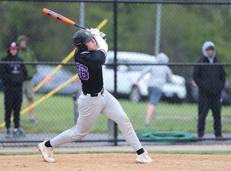 Downers Grove North's Jimmy Janicki (16) watches his pop-up during the varsity baseball game between Downers Grove South and Downers Grove North in Downers Grove on Saturday, April 29, 2023.