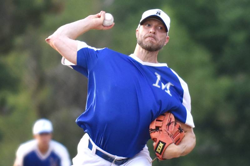 Beecher Muskies' Kris Honel throws a pitch against the Lombard Orioles during a Chicago Suburban Baseball League game at Gouwens Park in South Holland last month.