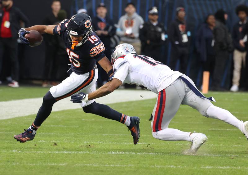 Chicago Bears wide receiver Rome Odunze tries to get by New England Patriots safety Marte Mapu during their game Sunday, Nov. 10, 2024, at Soldier Field in Chicago.
