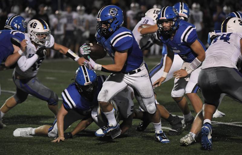 Lake Zurich’s Chris Pirrone runs against Warren in a football game in Lake Zurich on Friday, September 22, 2023.