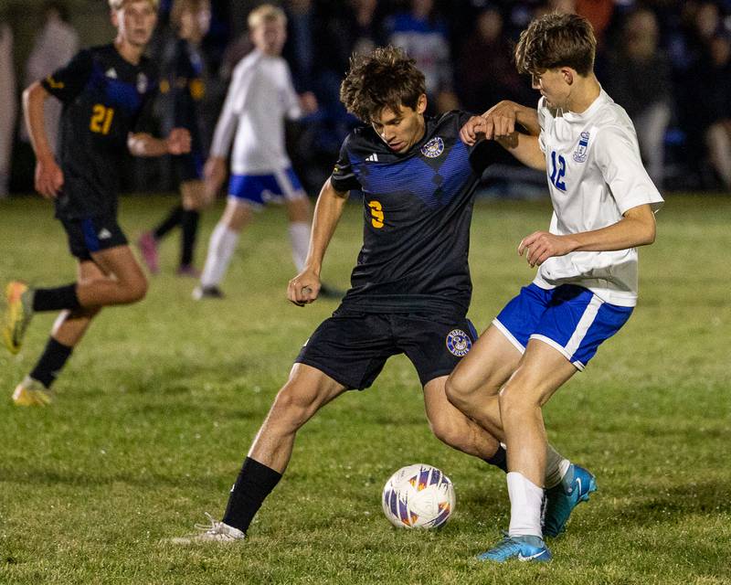 (9) of Somonauk interlocks/Leland/Newark arms with Gavin Pickert (12) of Hinckley-Big Rock as they fight over possession of ball during the Little Ten Conference Championship match on Thursday, Oct. 9, 2025 at Hinckley-Big Rock School in Hinckley.