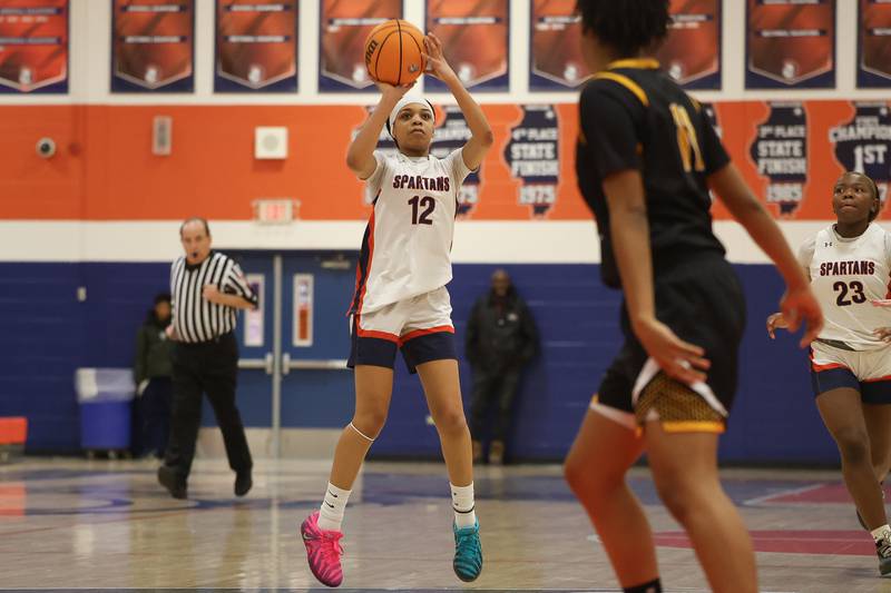 Romeoville’s Aaliyah Adams takes the outside shot against Joliet West on Thursday, Jan. 29, 2026 in Romeoville.