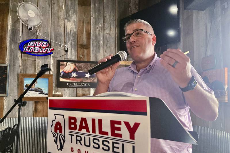 Republican candidate for Illinois governor Darren Bailey speaks to voters during a campaign stop in Athens, Ill., June 14, 2022. Bailey is seeking the Republican nomination to face Democratic Gov. J.B. Pritzker in November. (AP Photo/John O'Connor)