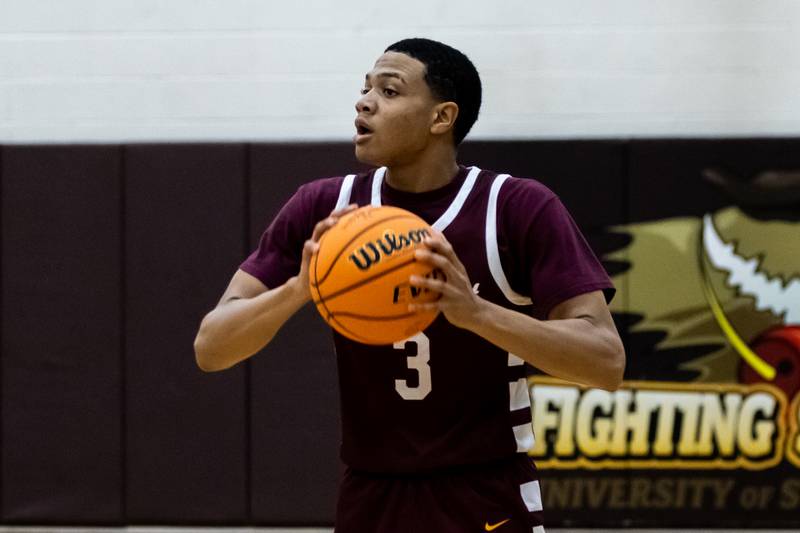 Lockport's Gavin Anderson looks for an open teammate during a WJOL Thanksgiving Classic Boys Basketball game against Joliet Central at the University of St. Francis’s Pat Sullivan Center in Joliet on Nov. 24, 2025.