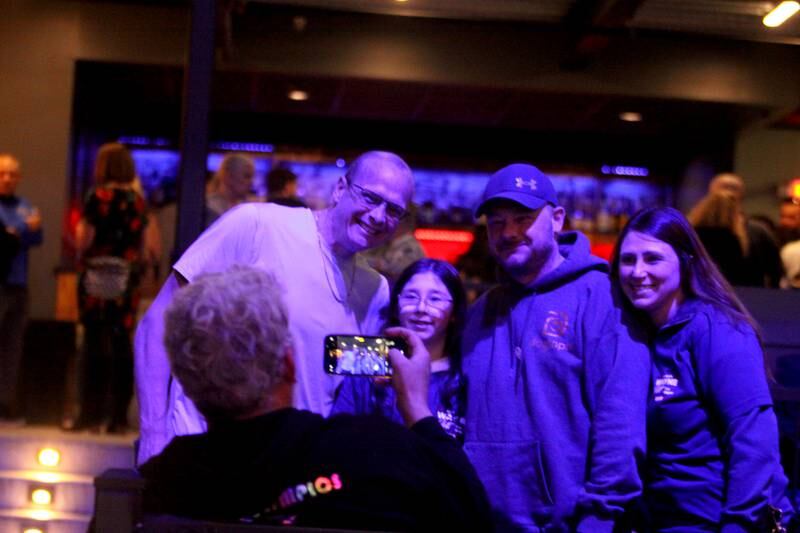 McHenry mayoral candidate and incumbent Wayne Jett hosted an election night party at The Vixen in McHenry on Tuesday, April 1, 2025. Jett has his picture made with party goers.