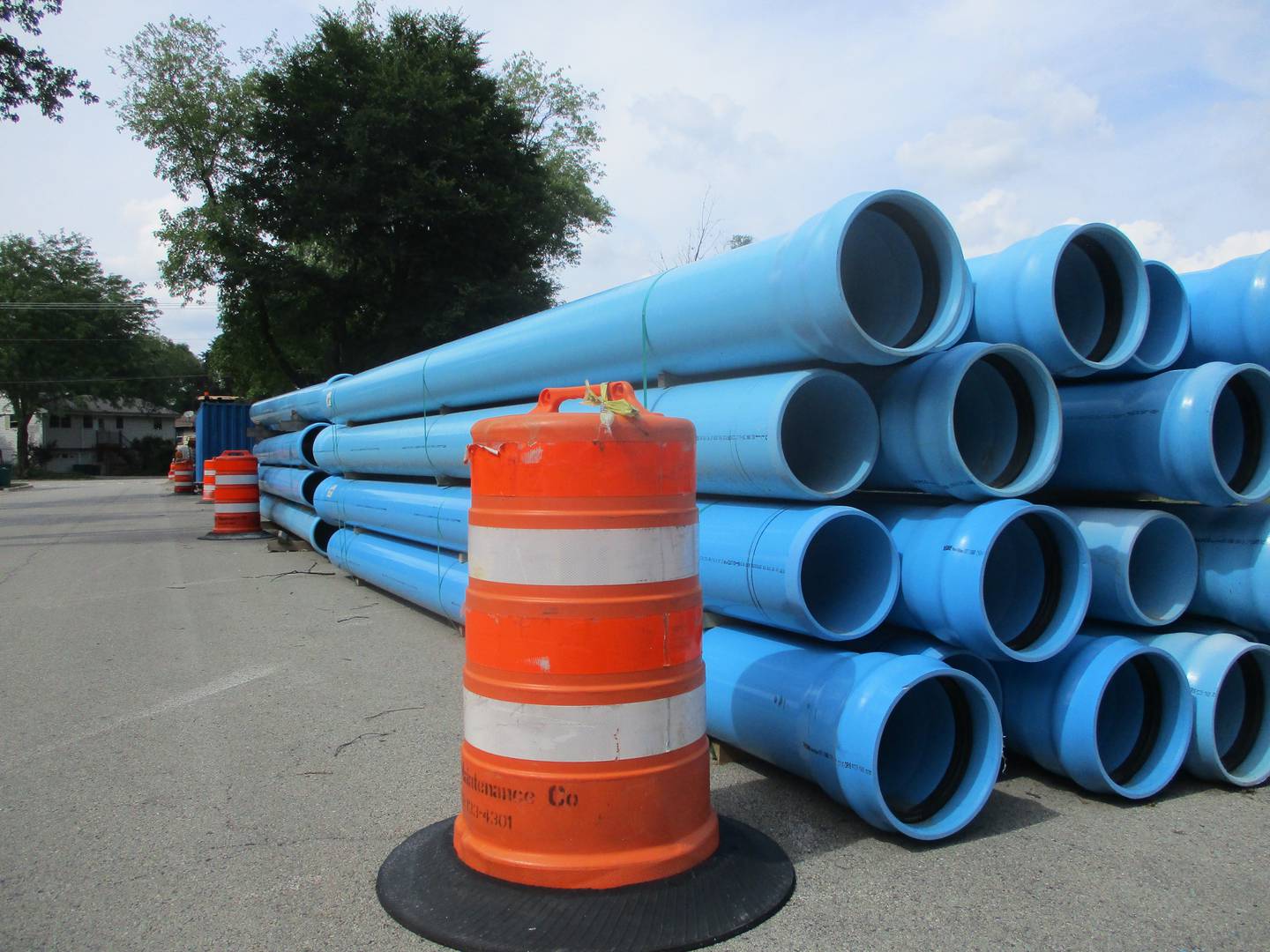 Pipe for the Ingalls Avenue water main project is stacked up along a side street on Thursday, July 6, 2023 in Joliet.