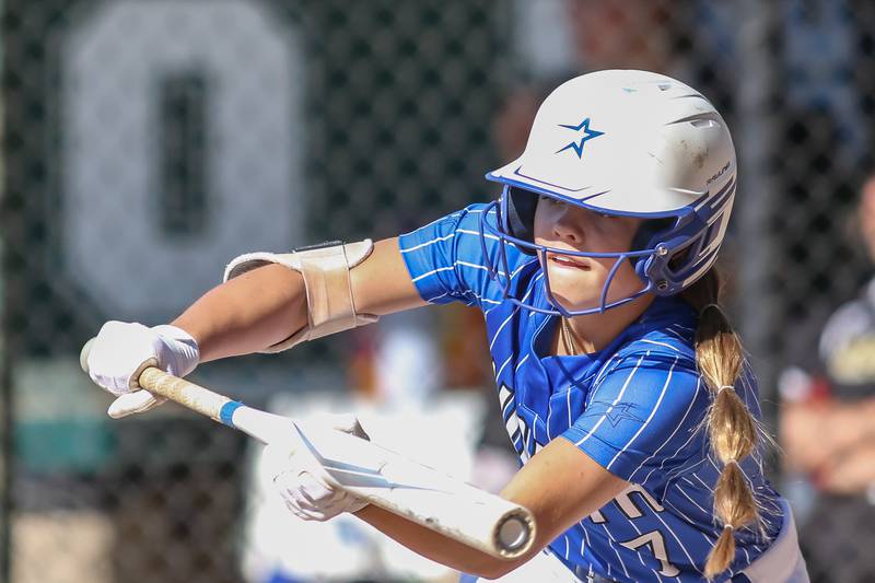 St Charles North's Mackenzie Patterson (7) squares up to bunt during the Class 4A Glenbard West Regional Final softball game between Glenbard North at St Charles North.  May 26, 2023.